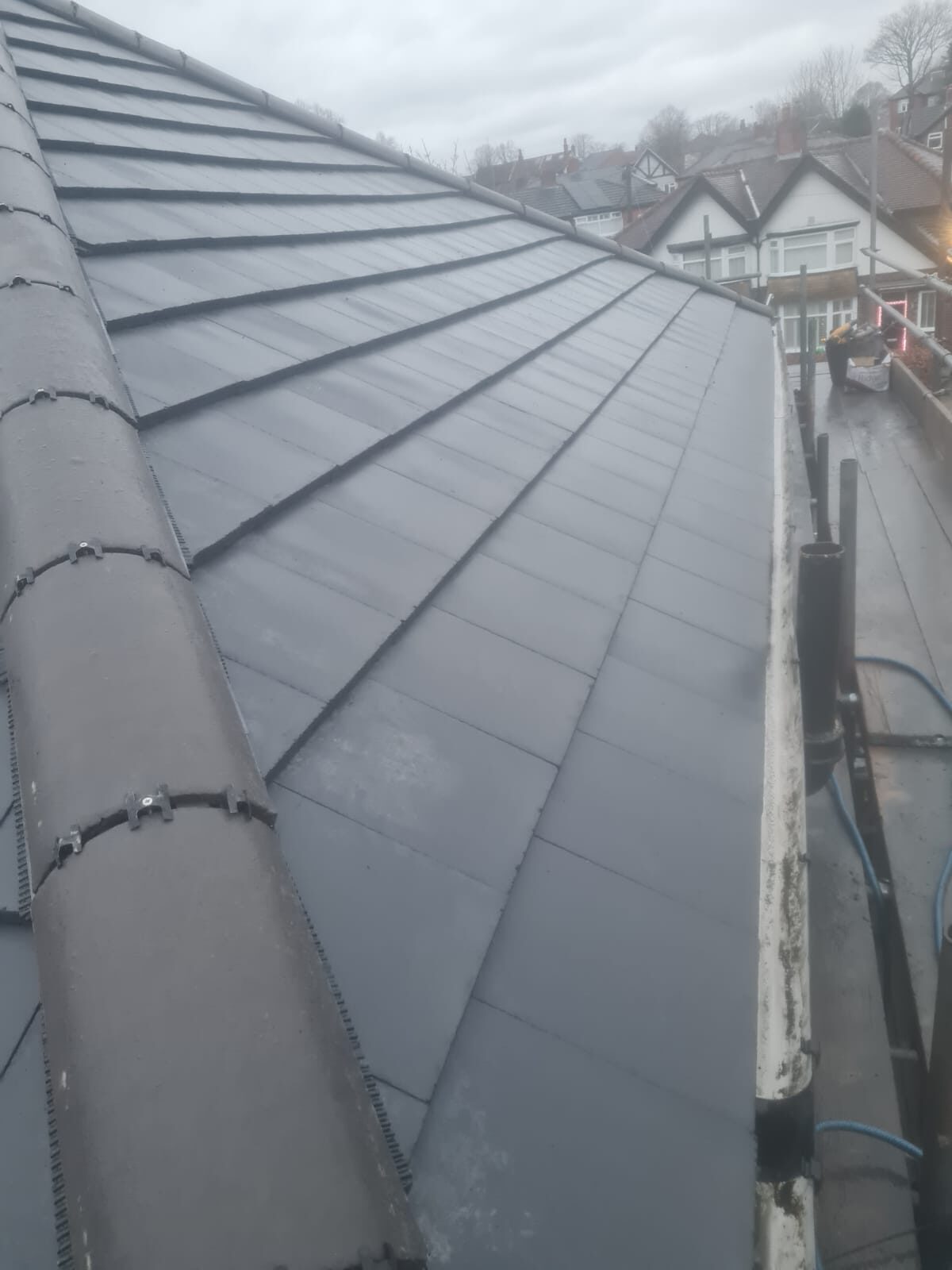 New grey tile roof with hip ridge Lancashire